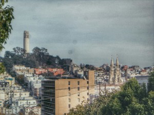 Coit Tower and Sts Peter & Paul Church via Lombard skyline